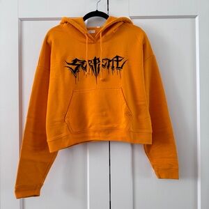 Aritzia Orange Hoodie with Black Graphic